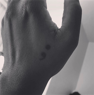 Illustration for article titled The Semicolon: How a Seemingly Obscure Tattoo Signifies Survival and Solidarity